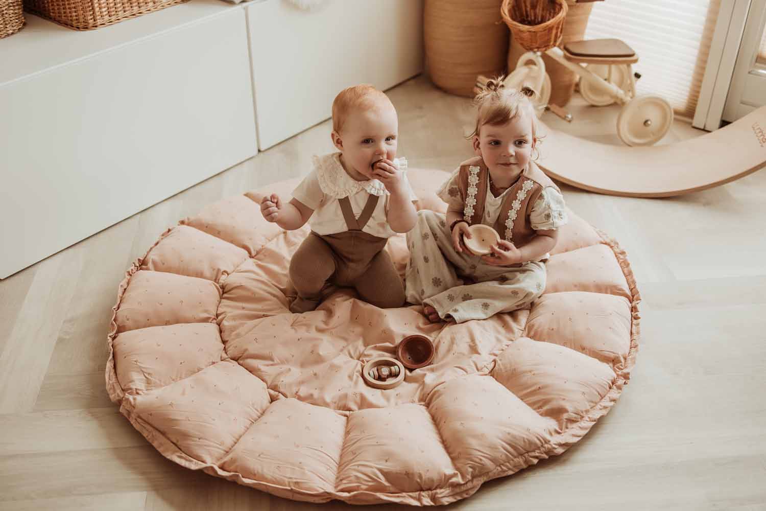 Bloom fleuri organic babymat, 2 children playing on open mat on floor in kidsroom