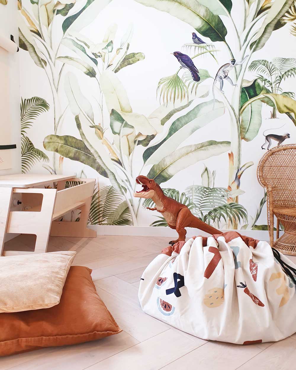 veggie numbers storage bag, closet on floor, jungle wall paper, pillows and cuddle dino