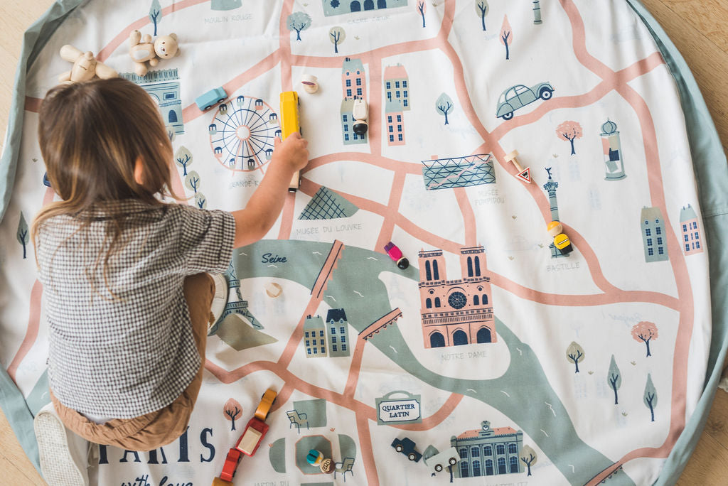 stylish designed Paris Map toy storage bag, child playing with wooden blocks