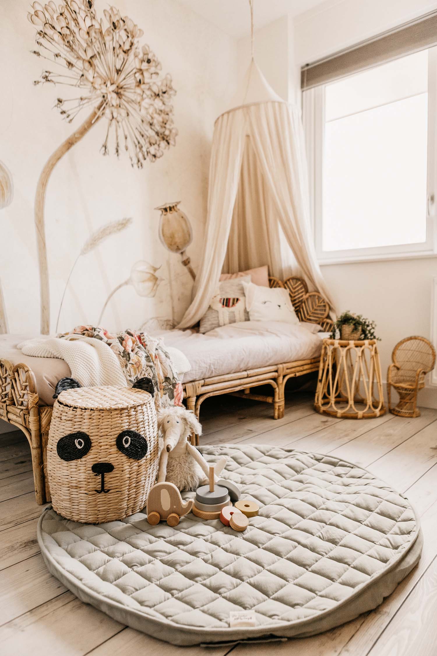 Meadow Green soft padded baby play mat, mat on floor in kidsroom with bed in corner