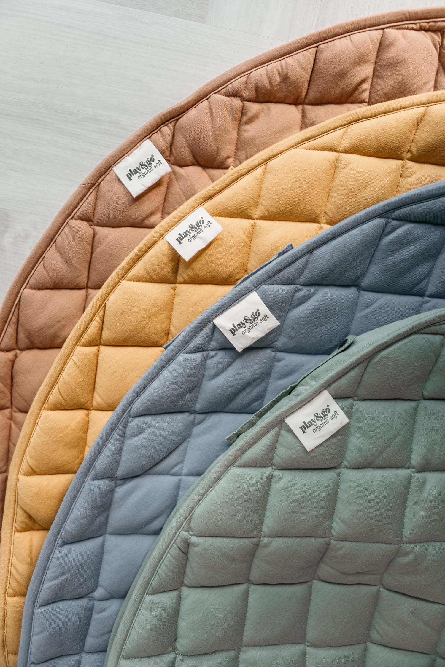 detail picture of the 4 colors of the organic soft padded baby play mats