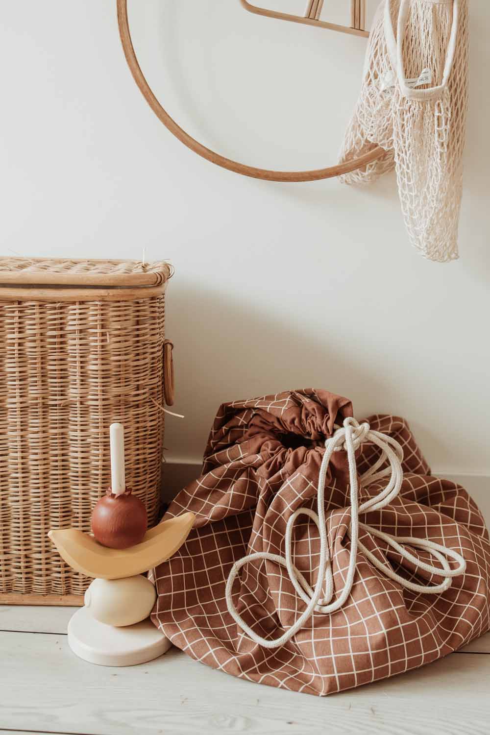 closed organic grid brown storage bag, next to wi