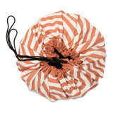 toy storage bag and play mat, bag closed, brown stripes
