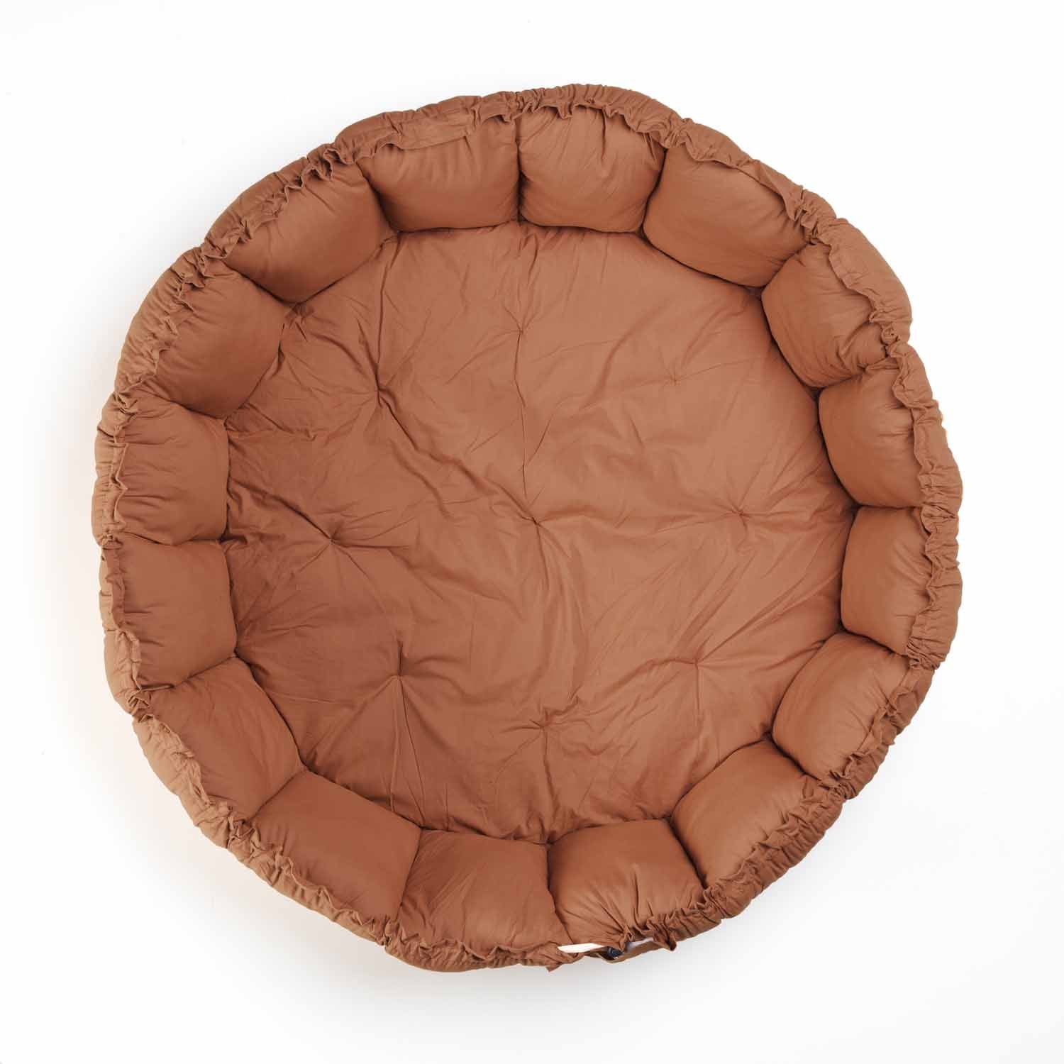 brown baby mat, crib, raised edges