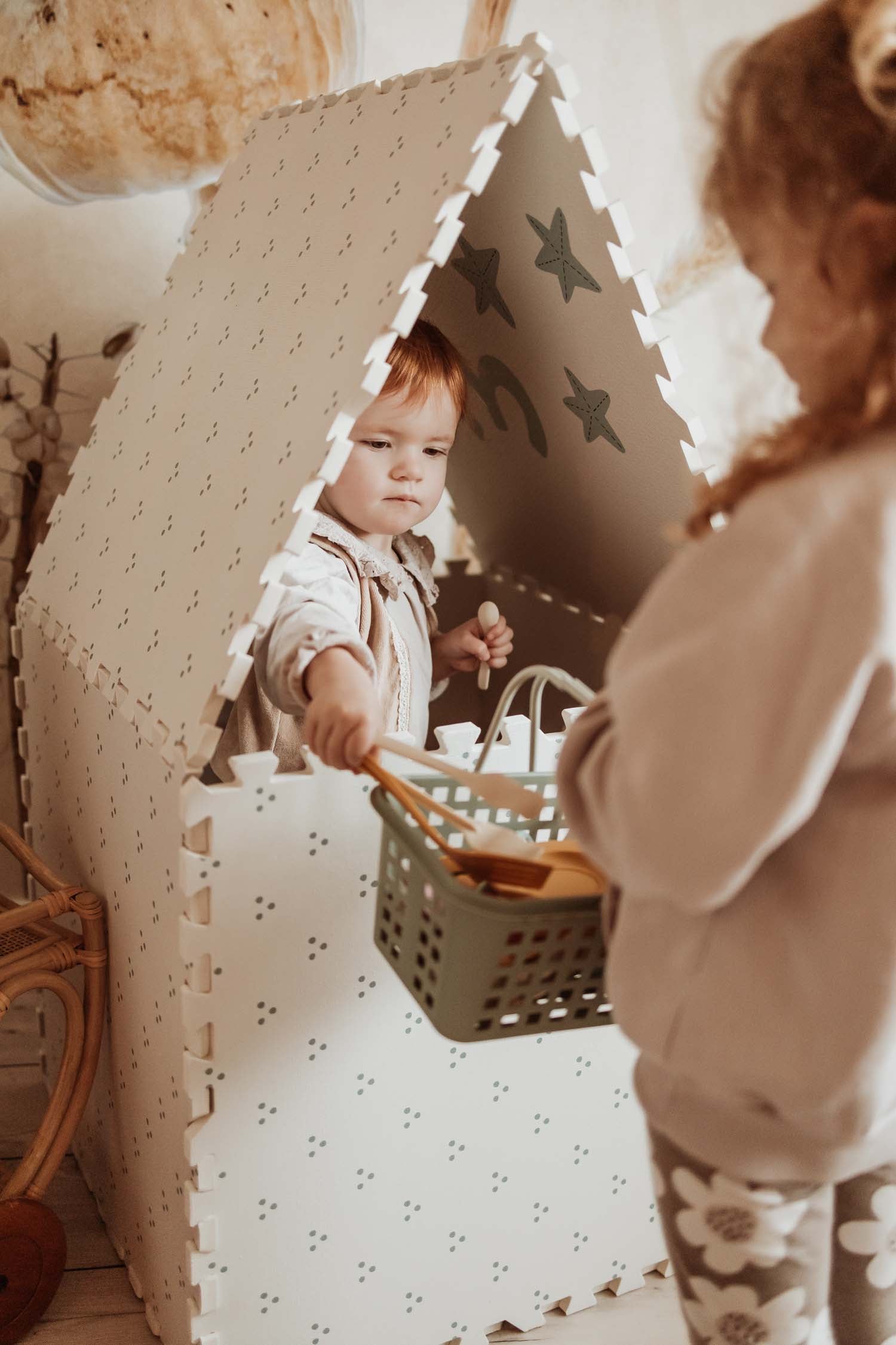 children playing in numbers/dots puzzlemat play house, playing with shopping toys