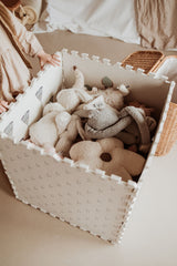 box made of numbers/dots puzzlemat, filled with cuddles